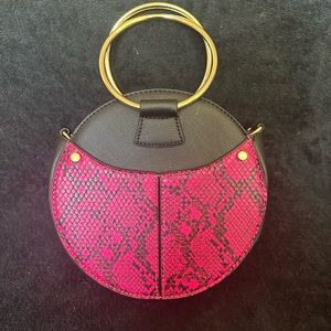 Snake skin neon pink leather shoulder bag with black adjustable strap